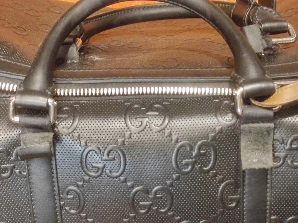 Restauration de sac de voyage en cuir